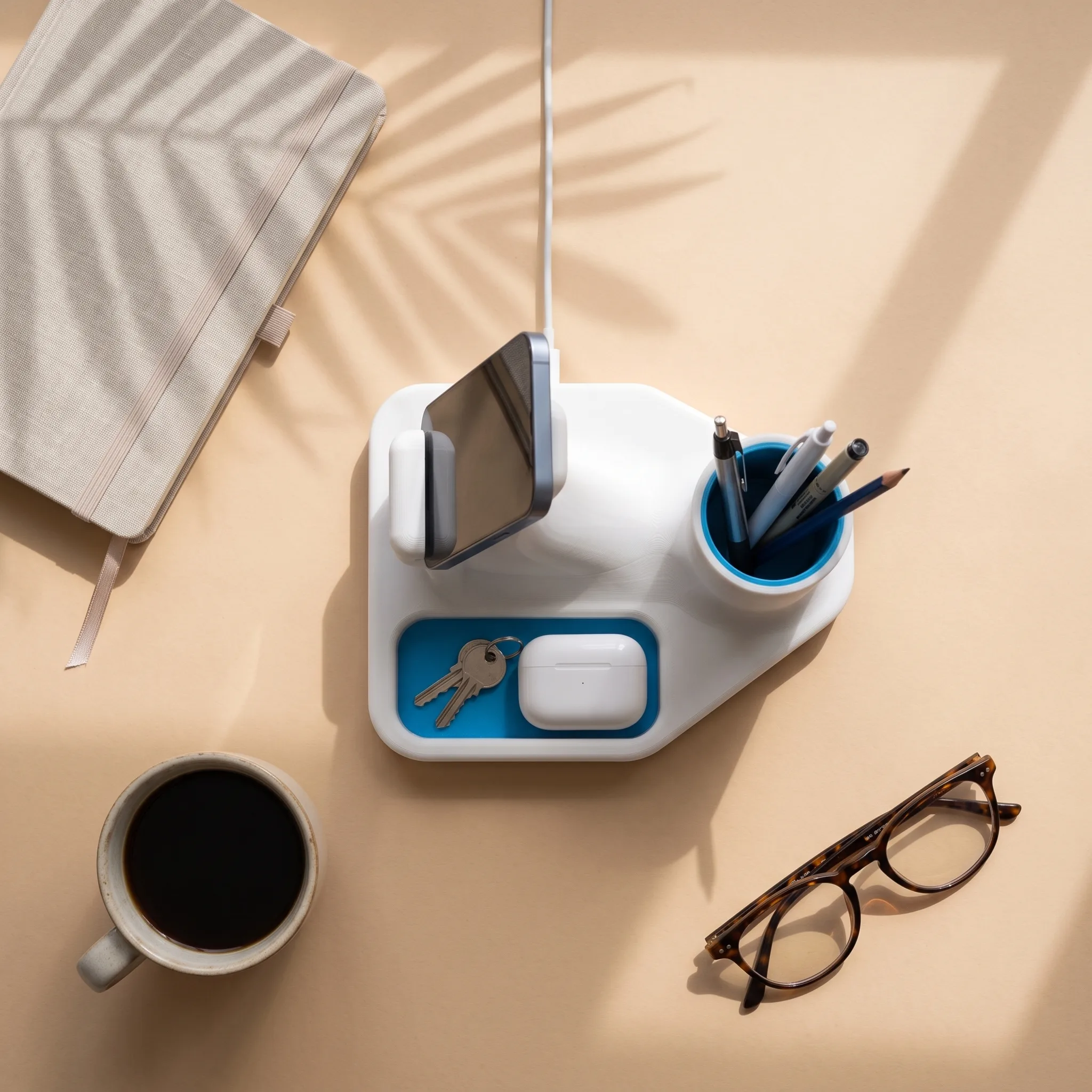 Top-down view with coffee, keys and glasses